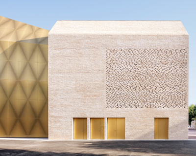 antonio virga architecte completes luminous, perforated cinema in cahors, france