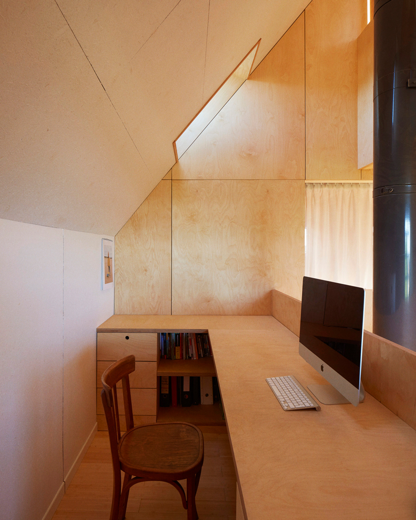 arba builds a timber house between two old stone walls in rural france - 13