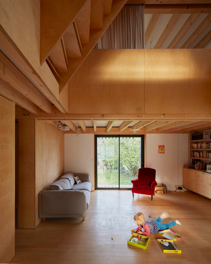 arba builds a timber house between two old stone walls in rural france - 9