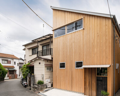 coil kazuteru matumura architects builds a climbing wall into 'F-house' in japan