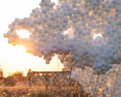 8,888 translucent white spheres make up this ephemeral pavilion designed by inclume
