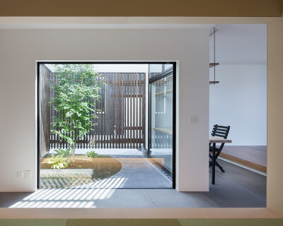 LEVEL architects conceals bright inner courtyard behind this house's blank façade in japan