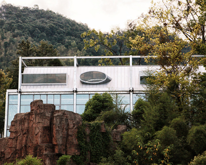 monolith architects transforms abandoned factory into 'ten times hotel' in rural china