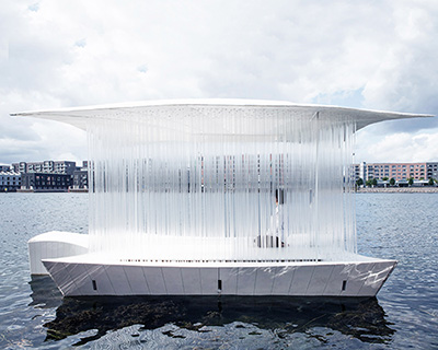 PAN- PROJECTS' transparent tea house Ø sets sail along copenhagen's canals