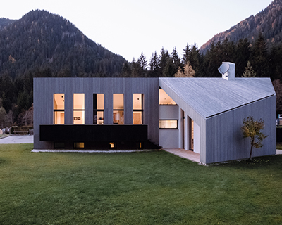 plasma studio's contemporary 'house L' integrates with its traditional tyrolean context