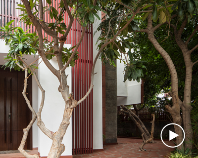 greenery weaves around the 'house with 49 trees' by RENESA in new delhi