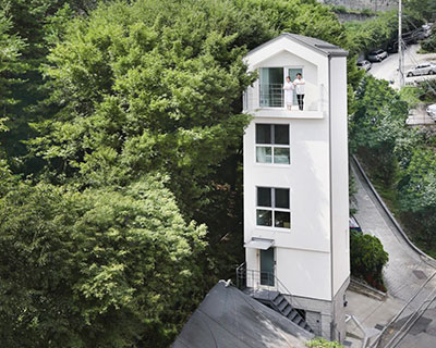 smaller architects build vertical tiny house in the heart of seoul