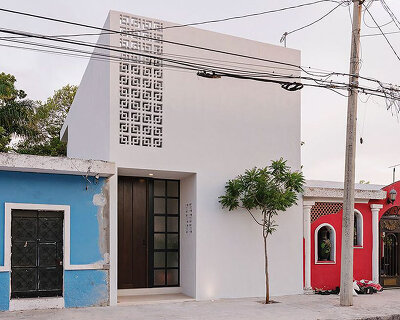 stone lattice facade clads tropical vacation house by workshop in mexico