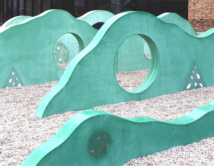 studio ossidiana creates colorful concrete landscape for school playground in the netherlands