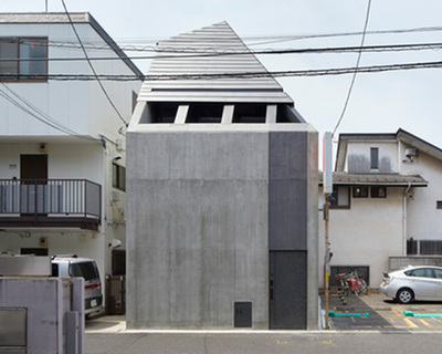 suppose design office builds bunker-like concrete house in tokyo