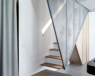 toledano + architects adds geometric wood and metal staircase to apartment in paris