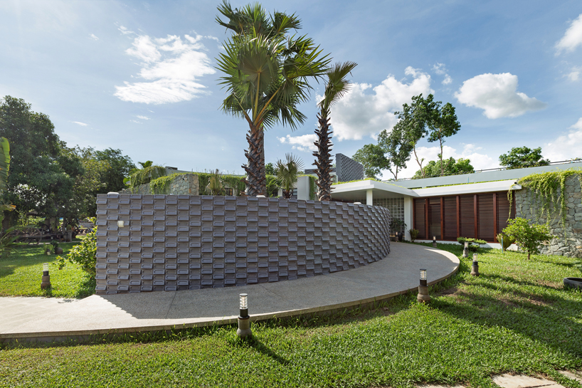 UAD architects tops 'the breeze house' in cambodia with a rooftop garden designboom