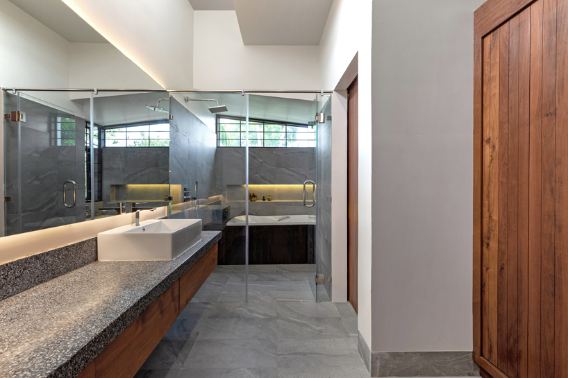 UAD architects tops 'the breeze house' in cambodia with a rooftop garden designboom