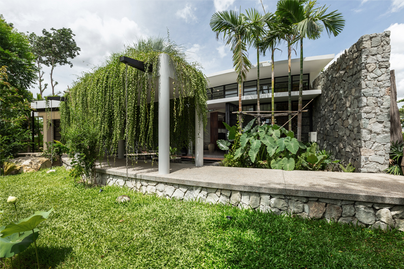 UAD architects tops 'the breeze house' in cambodia with a rooftop garden designboom