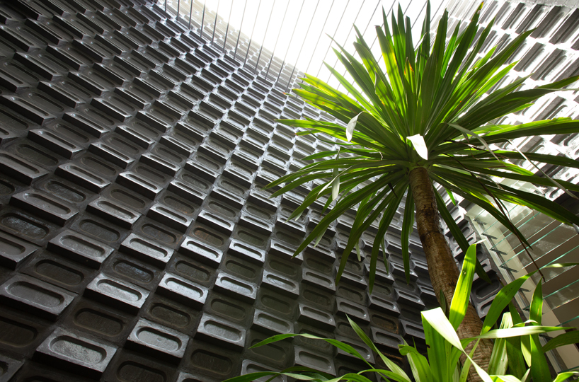 UAD architects tops 'the breeze house' in cambodia with a rooftop garden designboom