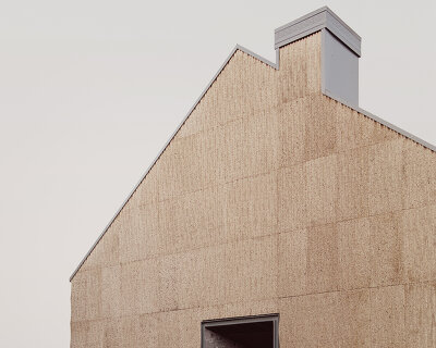 LCA architetti completes its minimalist 'casa quattro' with eccentric use of straw and cork
