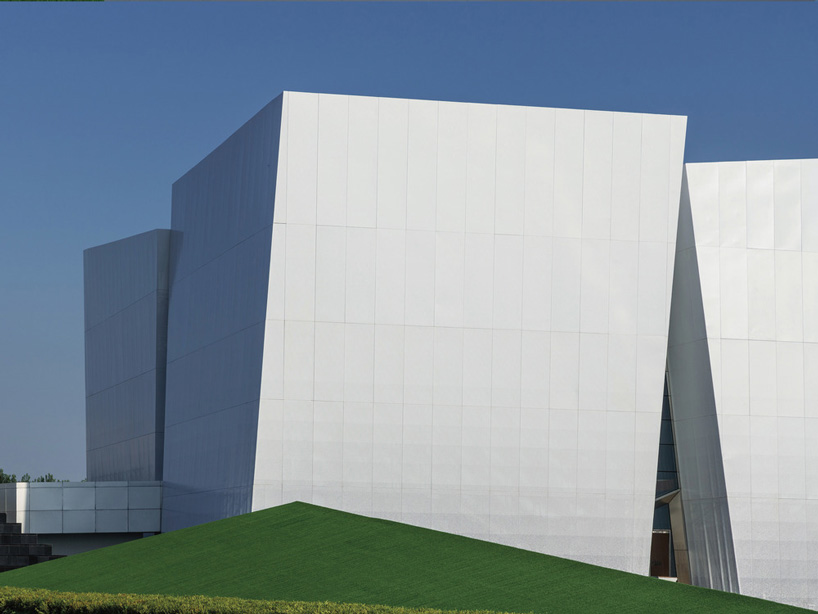 exterior view of shuifa info town property exhibition center in china by aoe