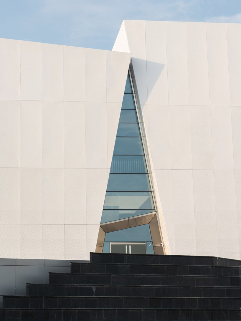 triangle-shaped entrance in shuifa info town property exhibition center in china by aoe