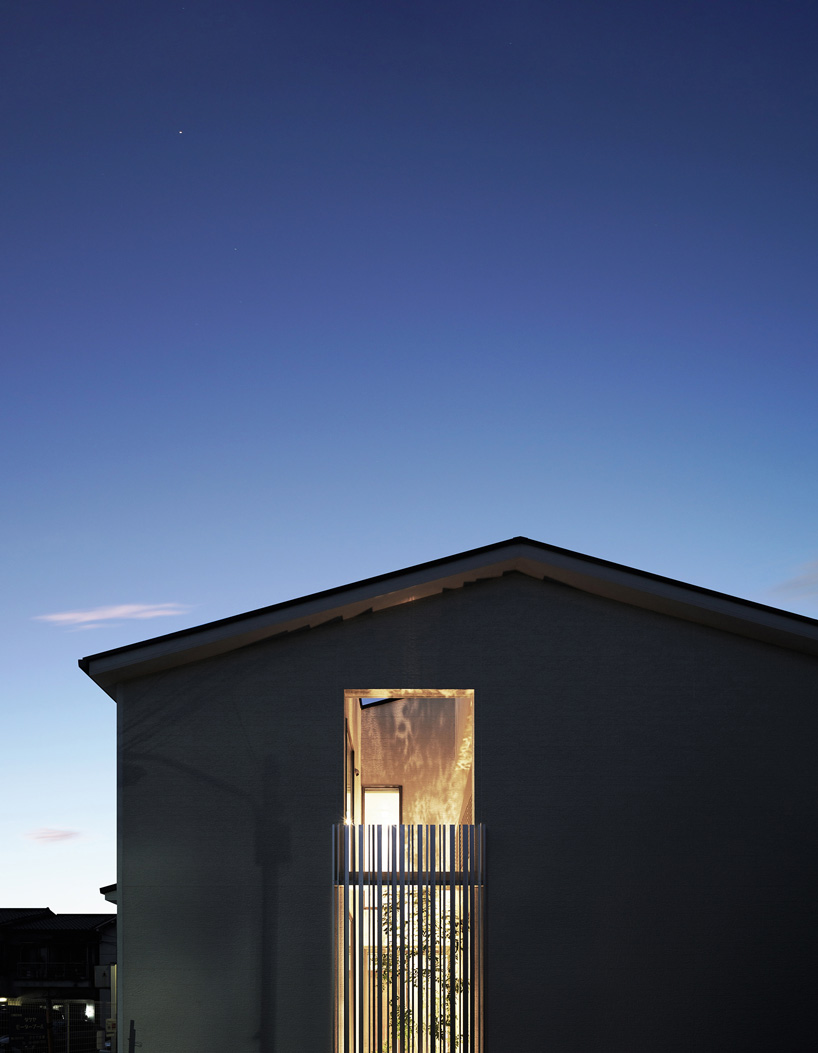 jun murata completes japanese guesthouse with small courtyard where light + shadow play