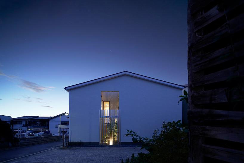 jun murata completes japanese guesthouse with small courtyard where light + shadow play