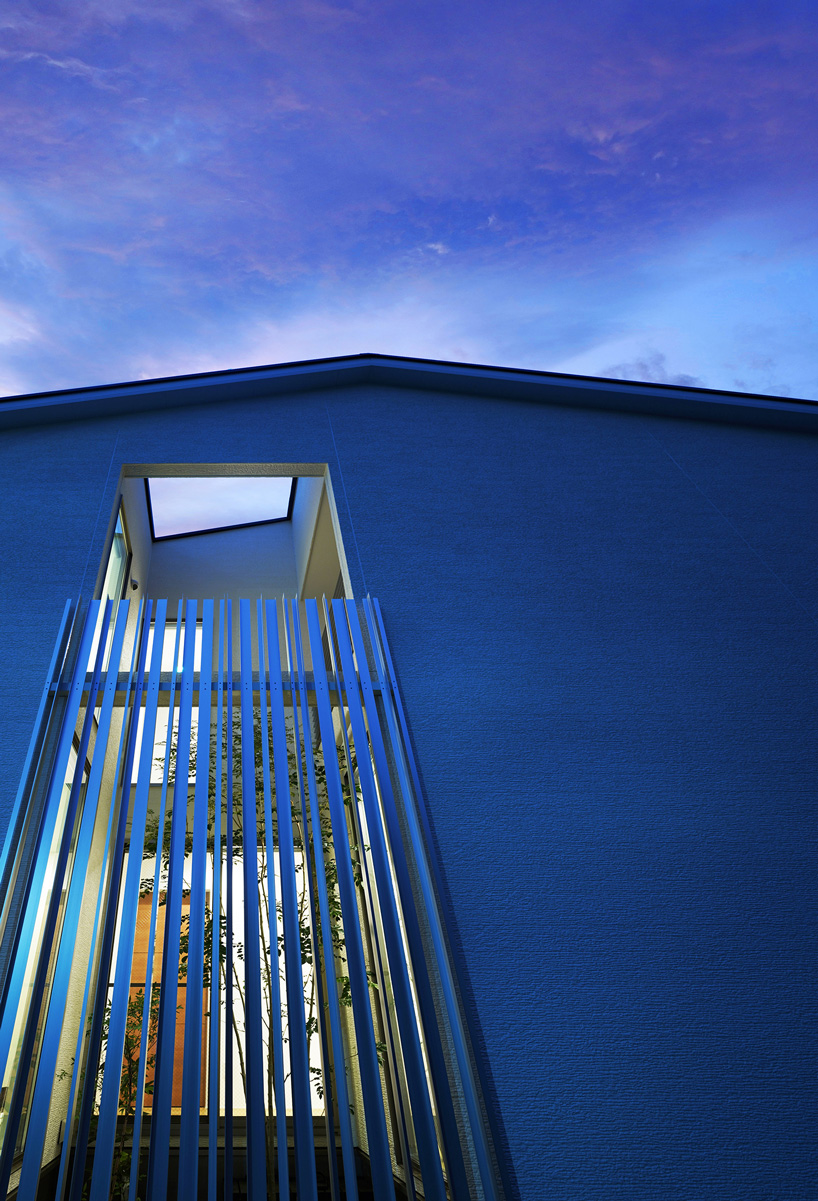 jun murata completes japanese guesthouse with small courtyard where light + shadow play