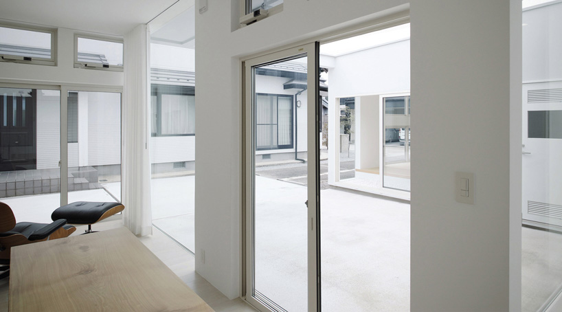 keisuke hatakenaka adds office + greenhouse to minimal residence in japan