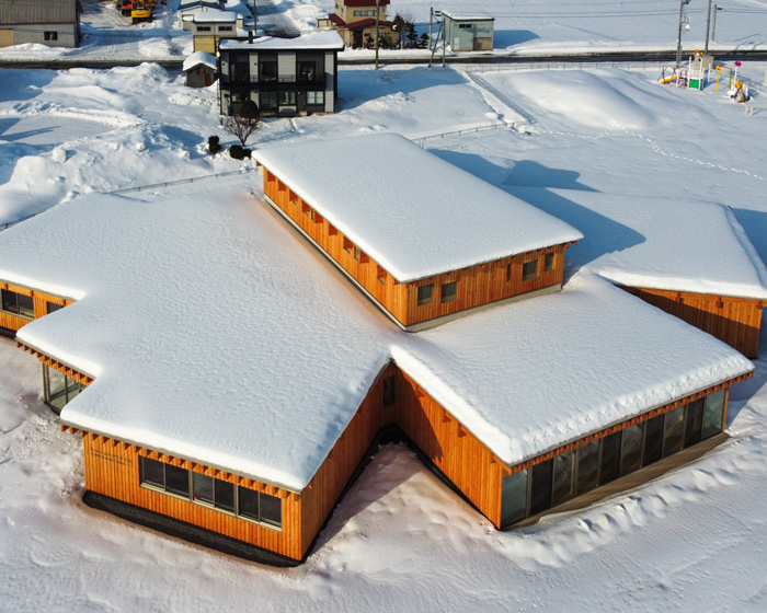 kengo kuma-designed nursery school in hokkaido honors the region's sunflowers
