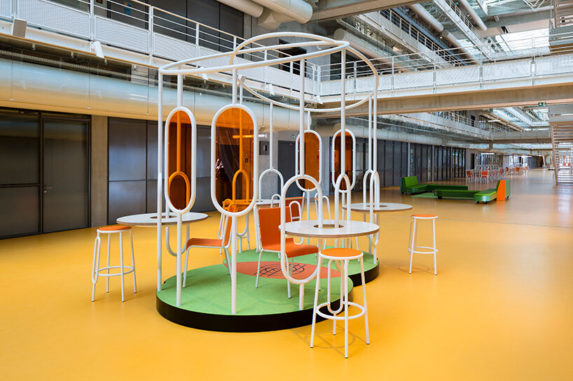 matali crasset fills a renzo piano-designed atrium in paris with archipelago furniture