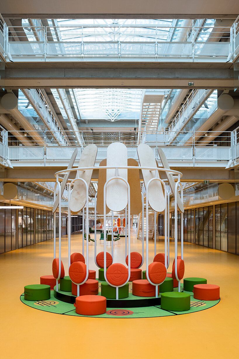 matali crasset fills a renzo piano-designed atrium in paris with archipelago furniture