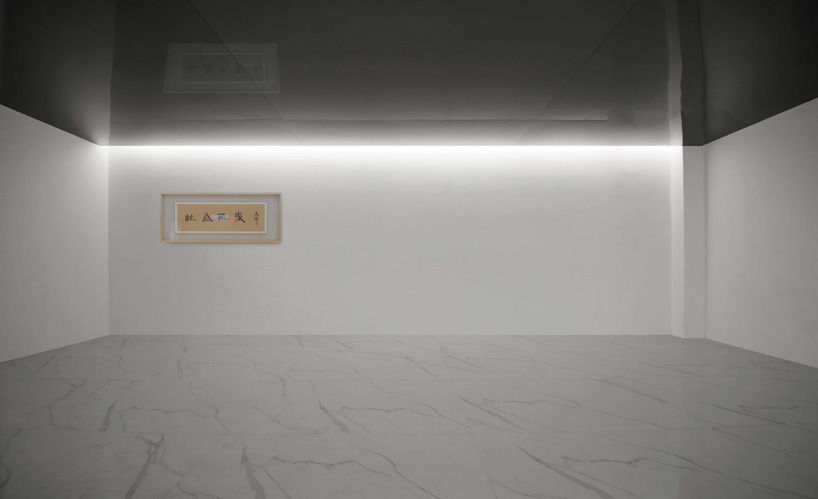 gallery space of jun murata's shipping container meditative gallery + artist's residence in beijing