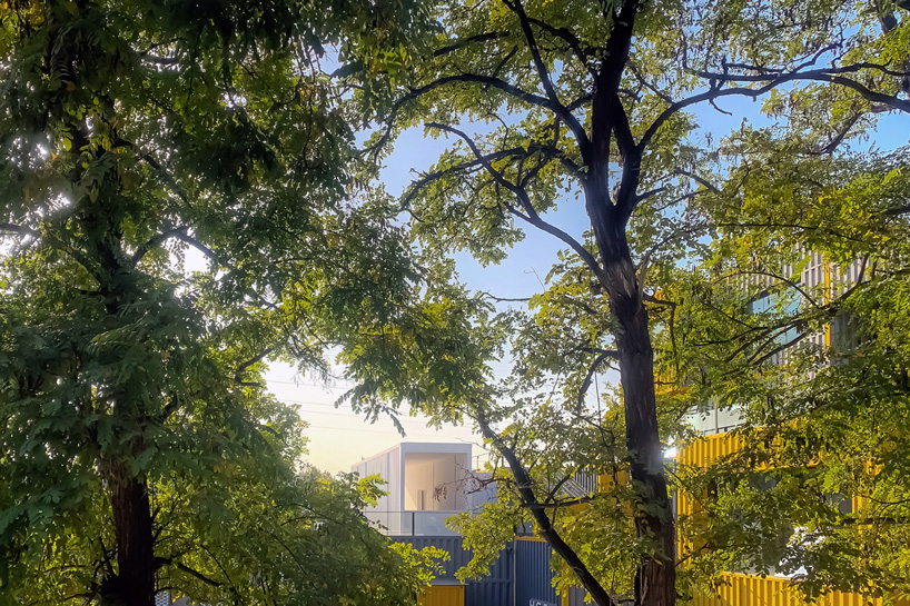 jun murata turns shipping container into meditative gallery + artist's residence in beijing