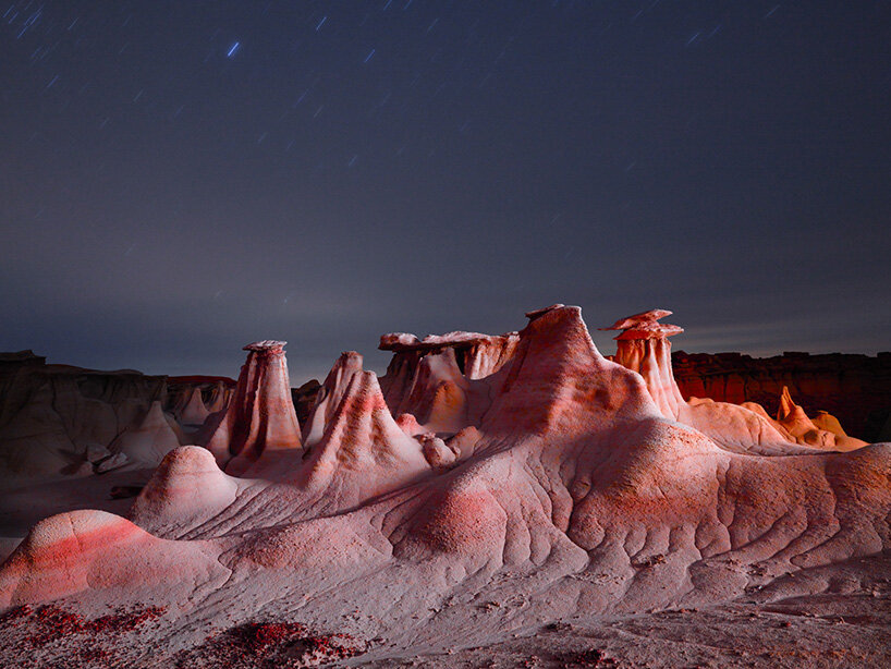 reuben wu uses drones to illuminate utah's erosional landscapes in light storm series