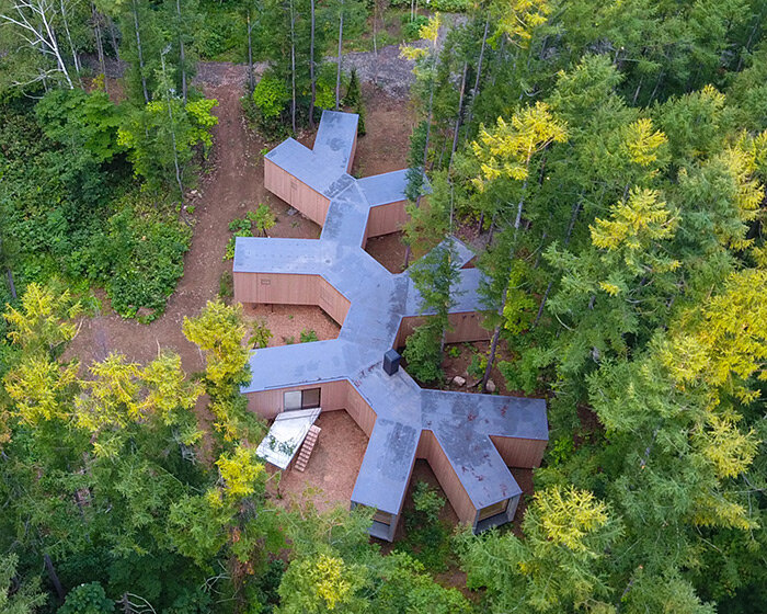 'house in the forest' by florian busch architects is a remote retreat in the woods of hokkaido