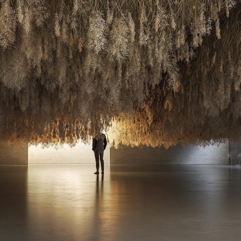 tadao cern suspends a cloud of dried grass strands in immersive installation 'french exit'