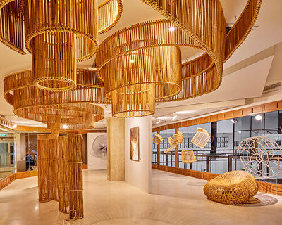 enter projects transforms bangkok exhibition space with sculptural rattan