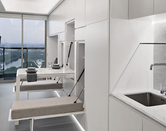k-thengono installs adaptable built-in cabinets within 42sqm apartment in indonesia
