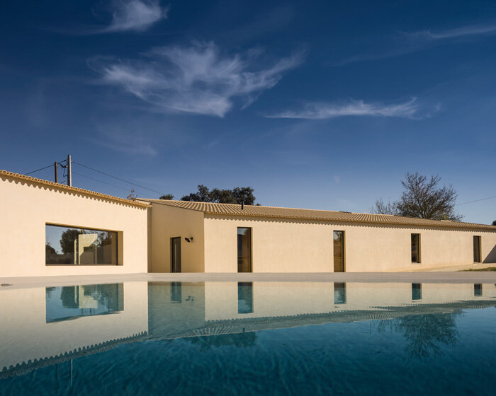 bica arquitectos combines two contiguous volumes into 'house in alentejo' in rural portugal