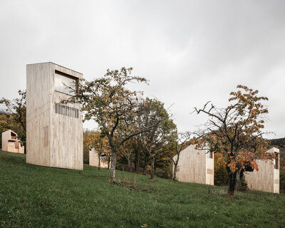 reiulf ramstad arkitekter scatters 14 cabins across french landscape with 48° nord hotel