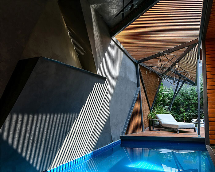 jutting planes & projecting volumes form the 'RH21' residential complex in india