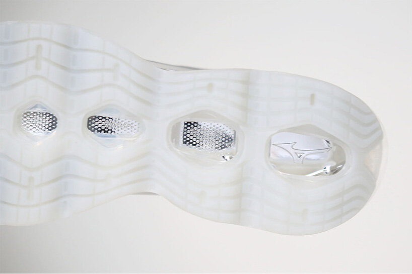 hajime sorayama re-envisions mizuno's wave prophecy silhouette