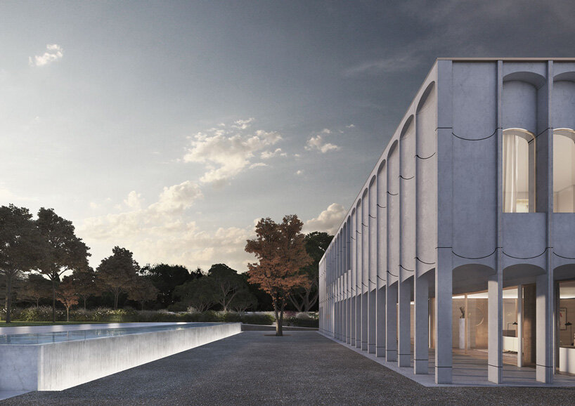 fluted concrete façade wraps PROMONTORIO's egyptian ambassador residence in lisbon