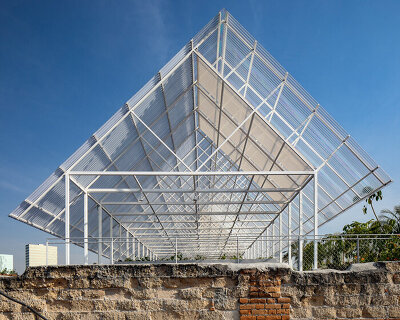 PRODUCTORA adds continuous canopy to roof of historical building in mexico city