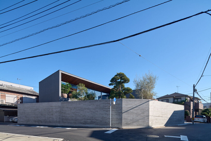 apollo architects & associates develops 'noble house' in japan around verdant garden