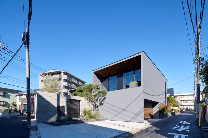 apollo architects & associates develops 'noble house' in japan around verdant garden