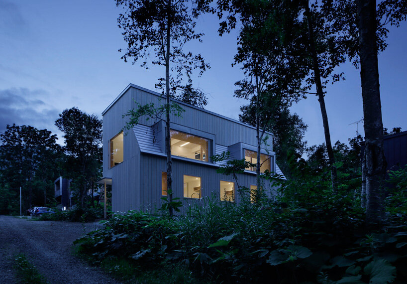 CASE-REAL blends 'chalet W' into the wooded landscape of japan's niseko ski resort