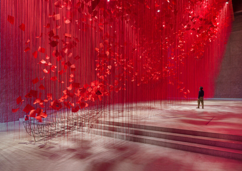tour chiharu shiota immersive thread installation, set within a former church in berlin