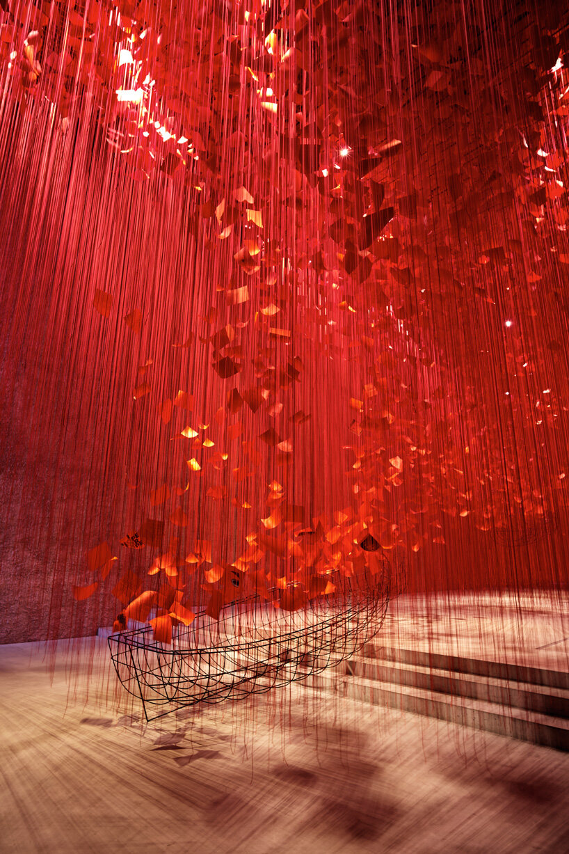 tour chiharu shiota immersive thread installation, set within a former church in berlin