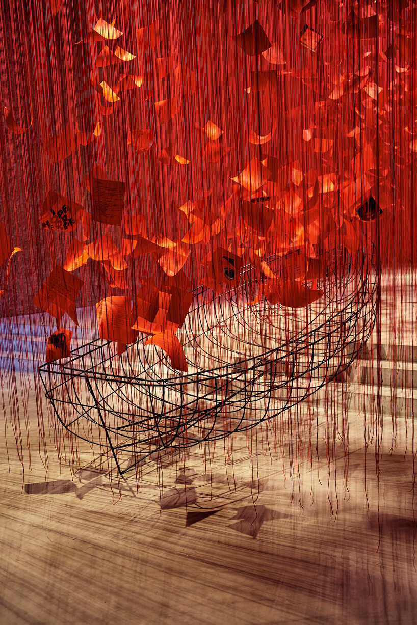 tour chiharu shiota immersive thread installation, set within a former church in berlin