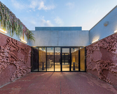 dmvA expresses mechelen's arts center nOna with undulating fields of brickwork
