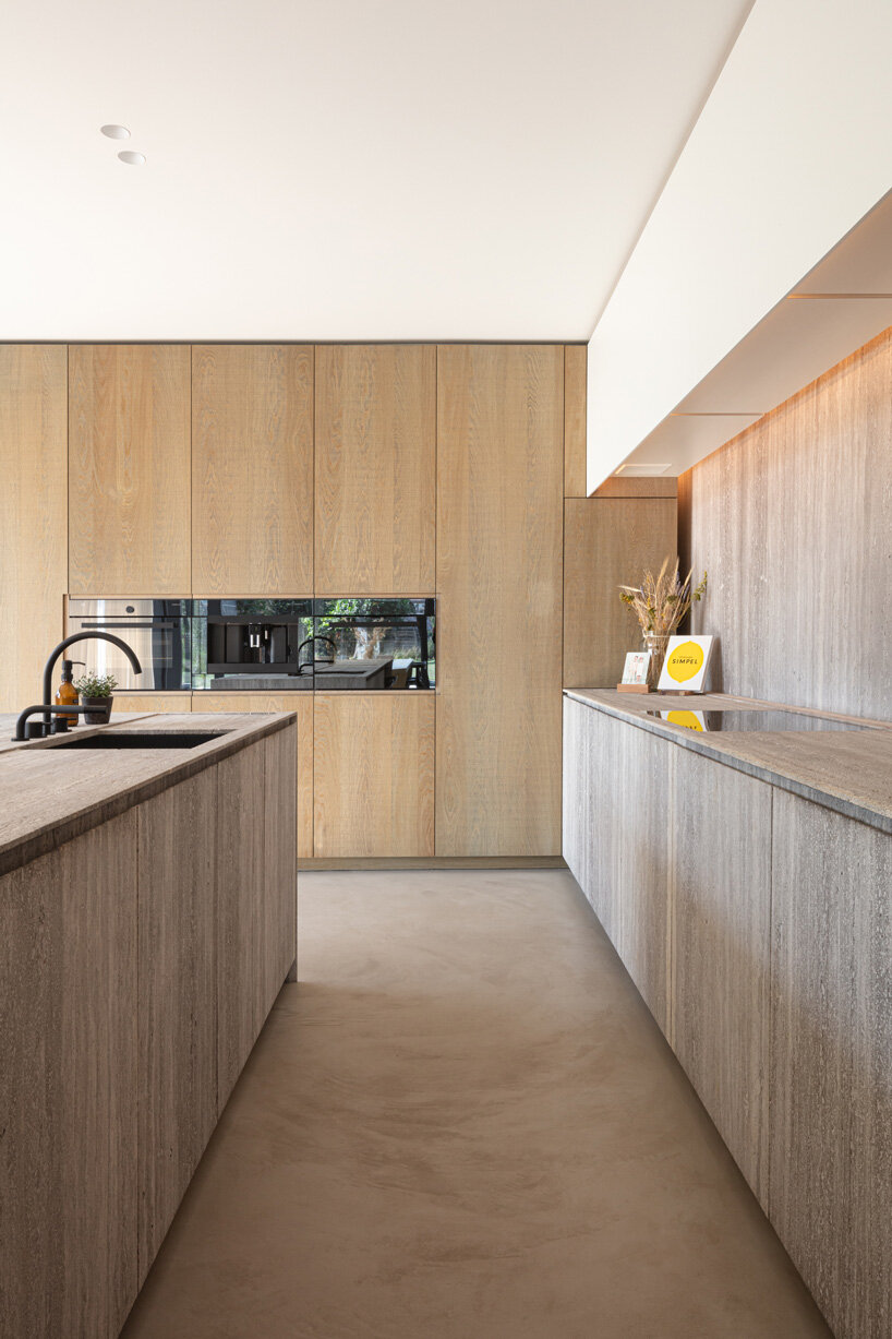 'residence DDE' by govaert & vanhoutte architects is a minimal concrete villa in rural belgium